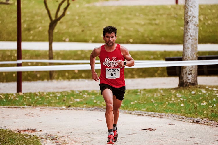 Photo Of Sportsman Running