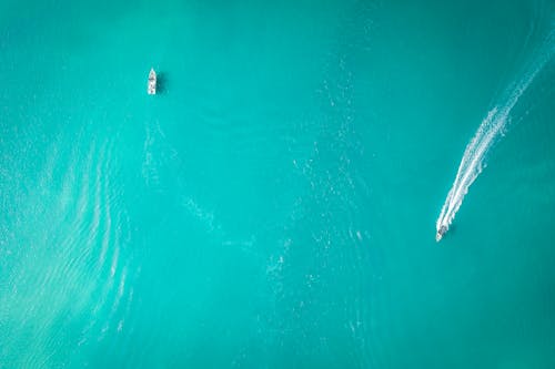 Aerial azure sea with floating boats