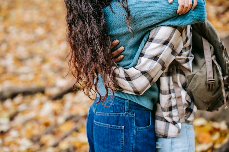 Crop Couple Embracing In Nature