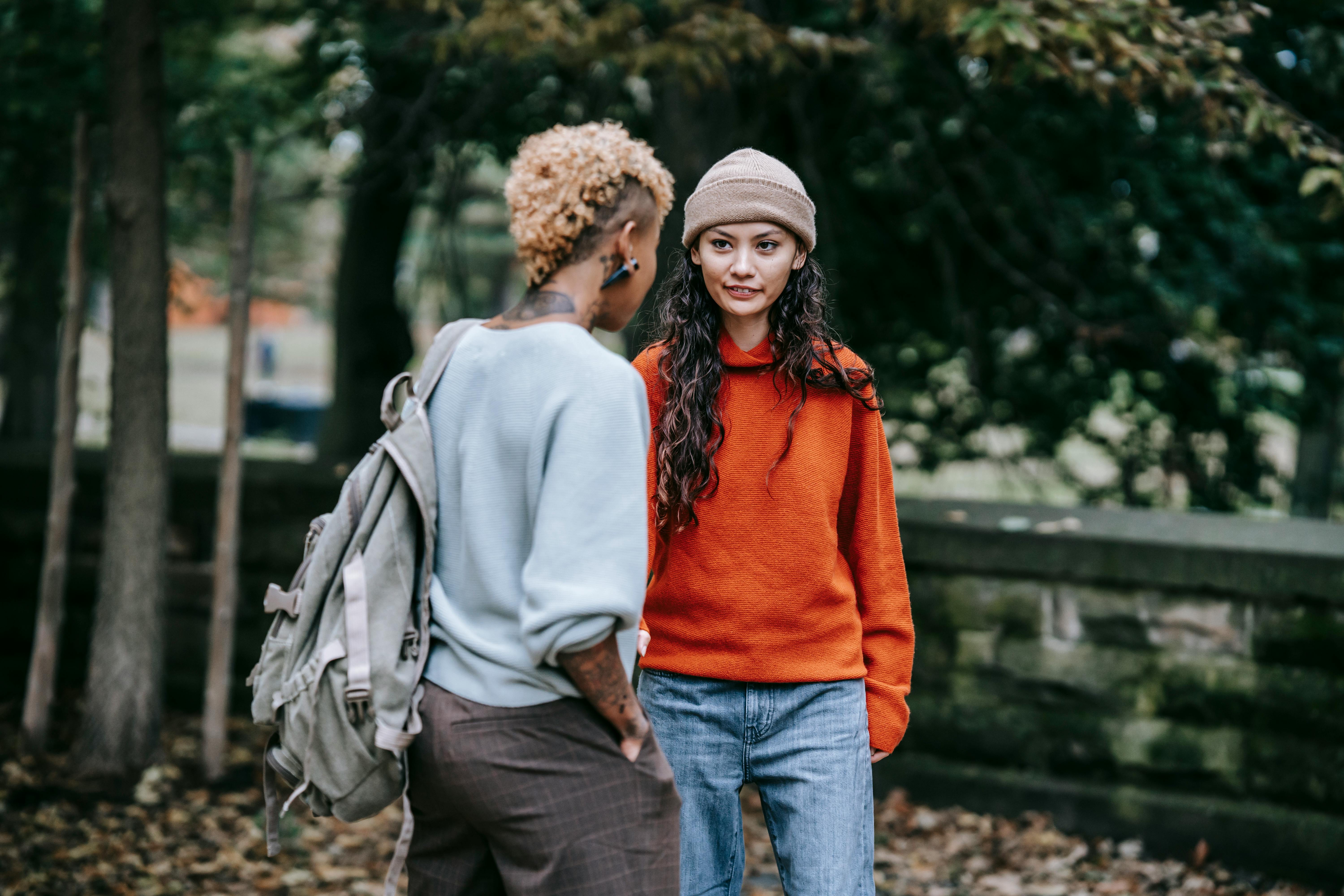 multiracial lesbian couple in park