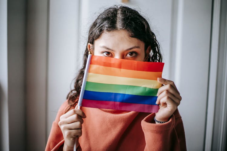 Young Ethnic Woman With Colorful LGBT Flag