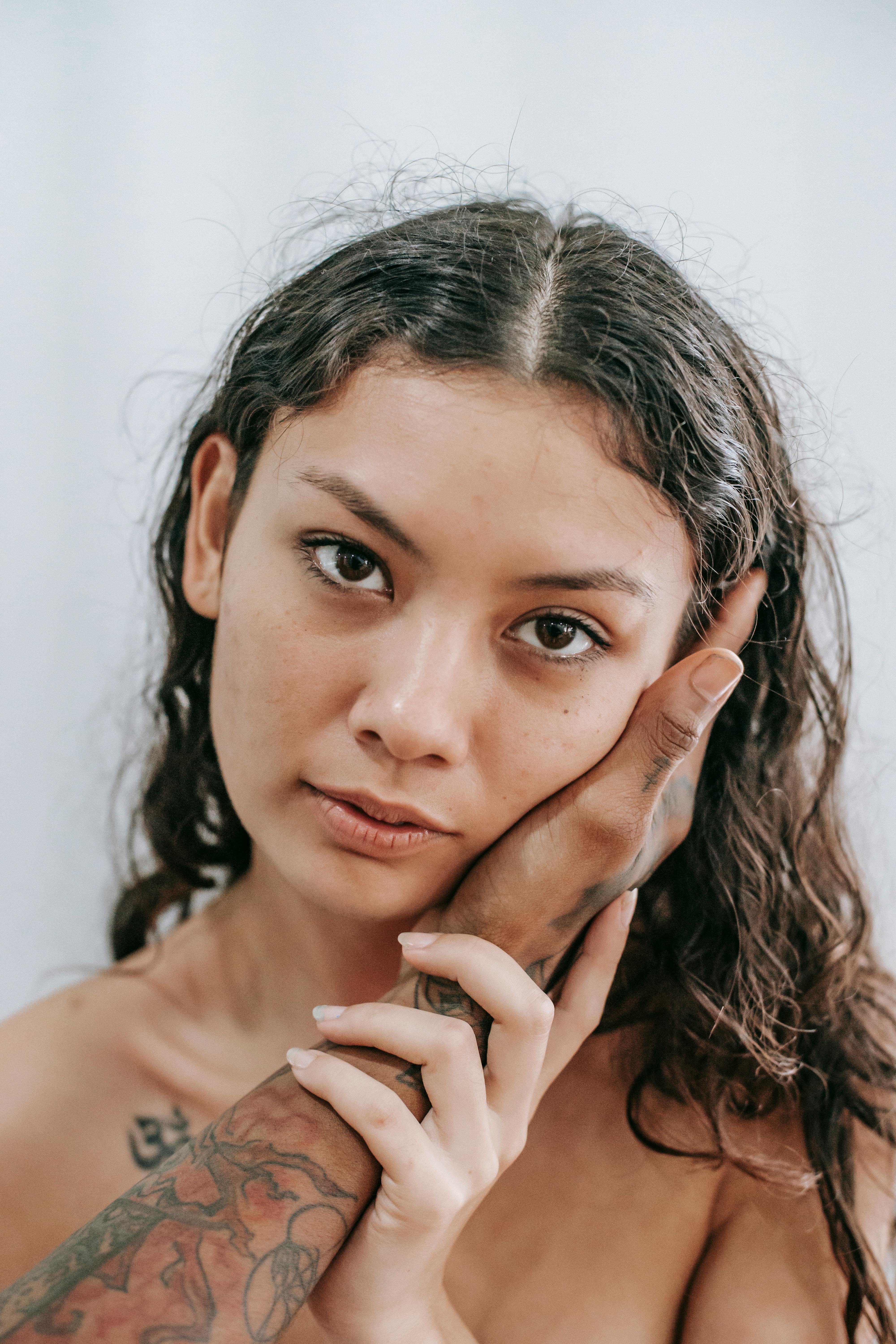 anonymous black person touching cheek of girlfriend