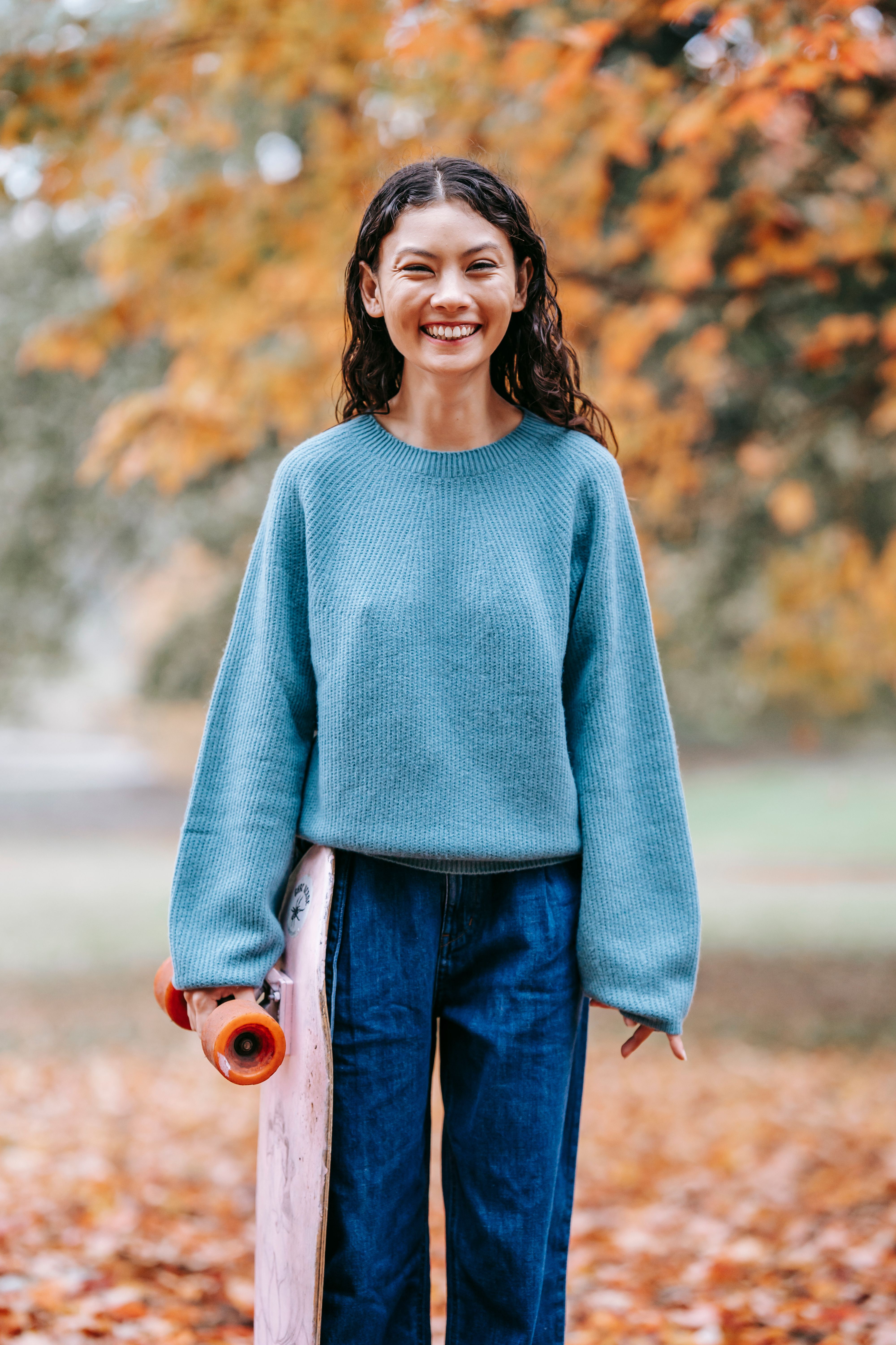 Powder blue cashmere sweater with grey pants
