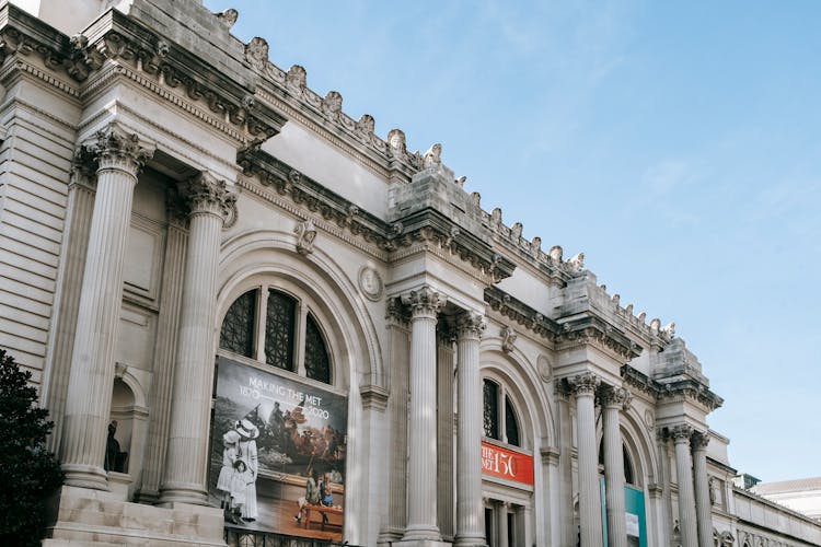 Facade Of Famous Art Museum With Columns And Sculptures