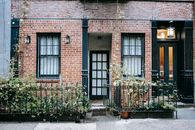 Porch of building with brick wall