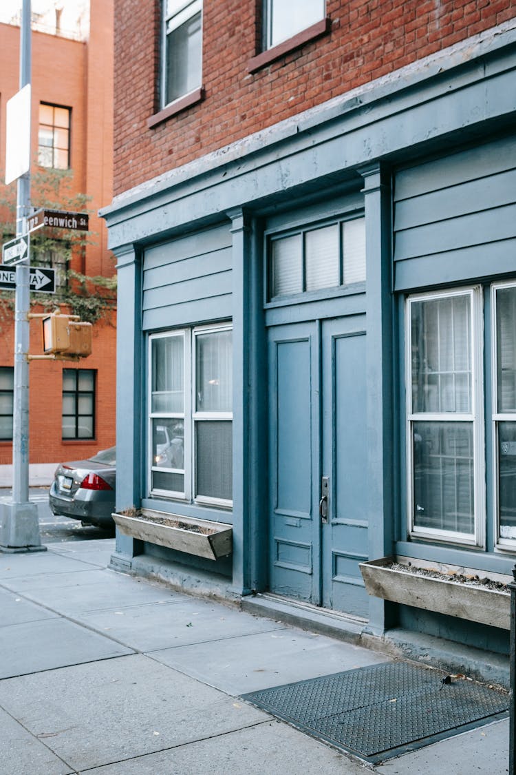 Exterior Of Residential Building With Blue Door