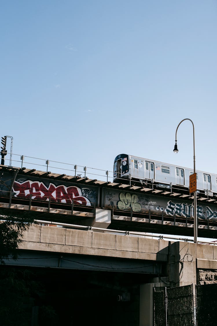 Bridge With Train On Railway In City