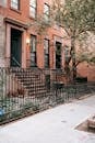 Contemporary brick house enclosed with fence