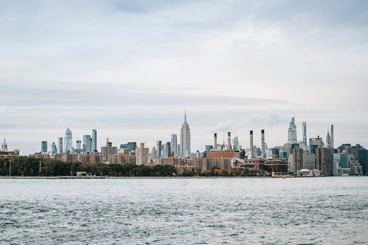 Cityscape Of Modern Urban Megapolis On River Coast