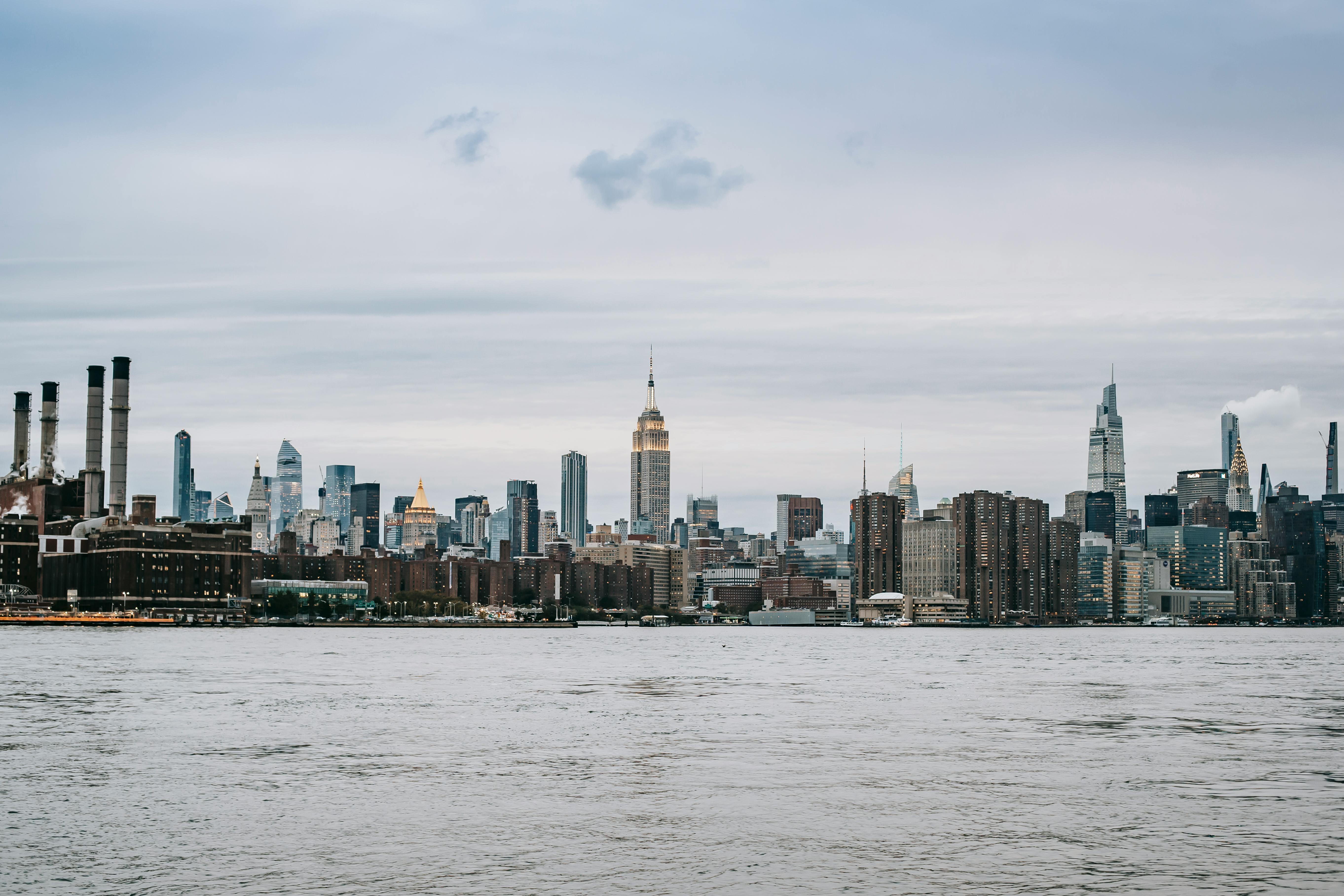 skyscrapers of contemporary urban metropolis located on riverside