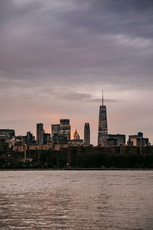 Free Skyline of big city with glass and concrete skyscrapers located on river shore in USA Stock Photo