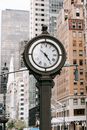 Vintage clock in city on street