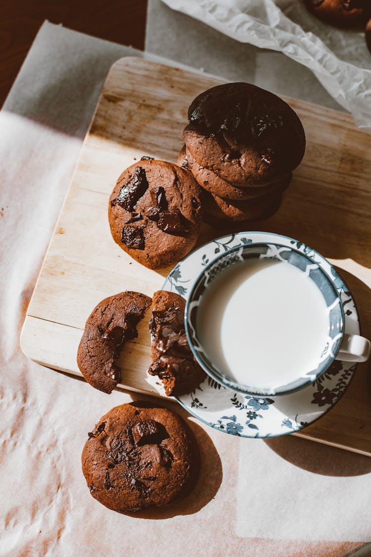 Chocolate Cookies And A Cup Of Milk 