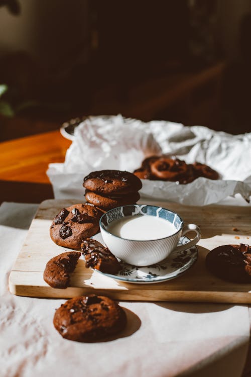 Free Chocolate Cookies and Cup of Milk Stock Photo