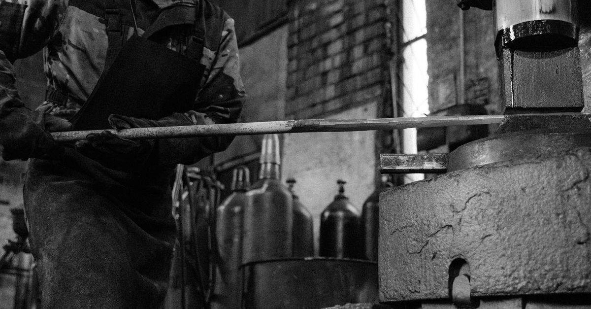 A Man Forging a Metal · Free Stock Photo