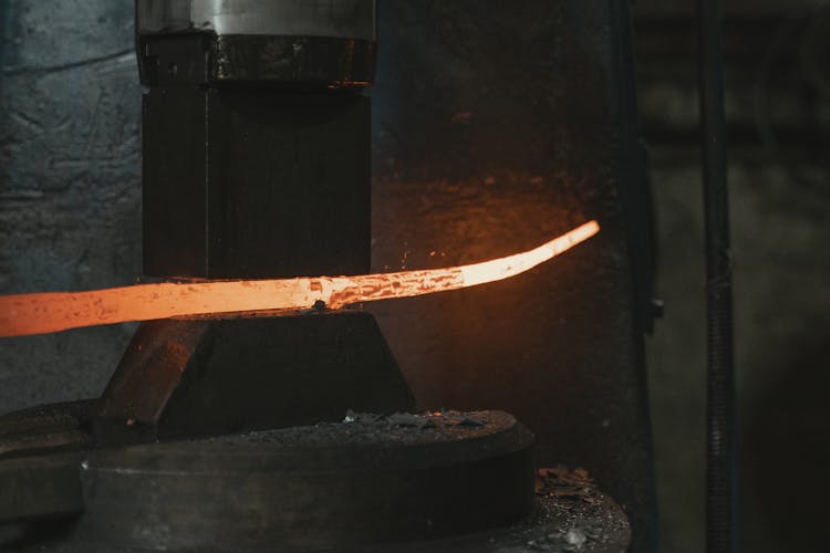 Hot Metal Being Formed In A Machine