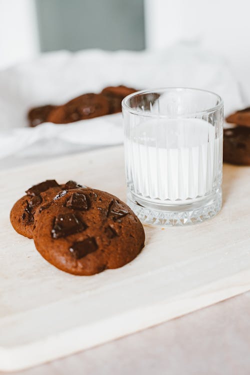 Free Chocolate Chip Cookies and a Glass of Milk  Stock Photo