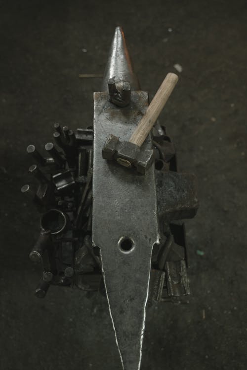 Blacksmith`s Workplace with Hammer and Anvil