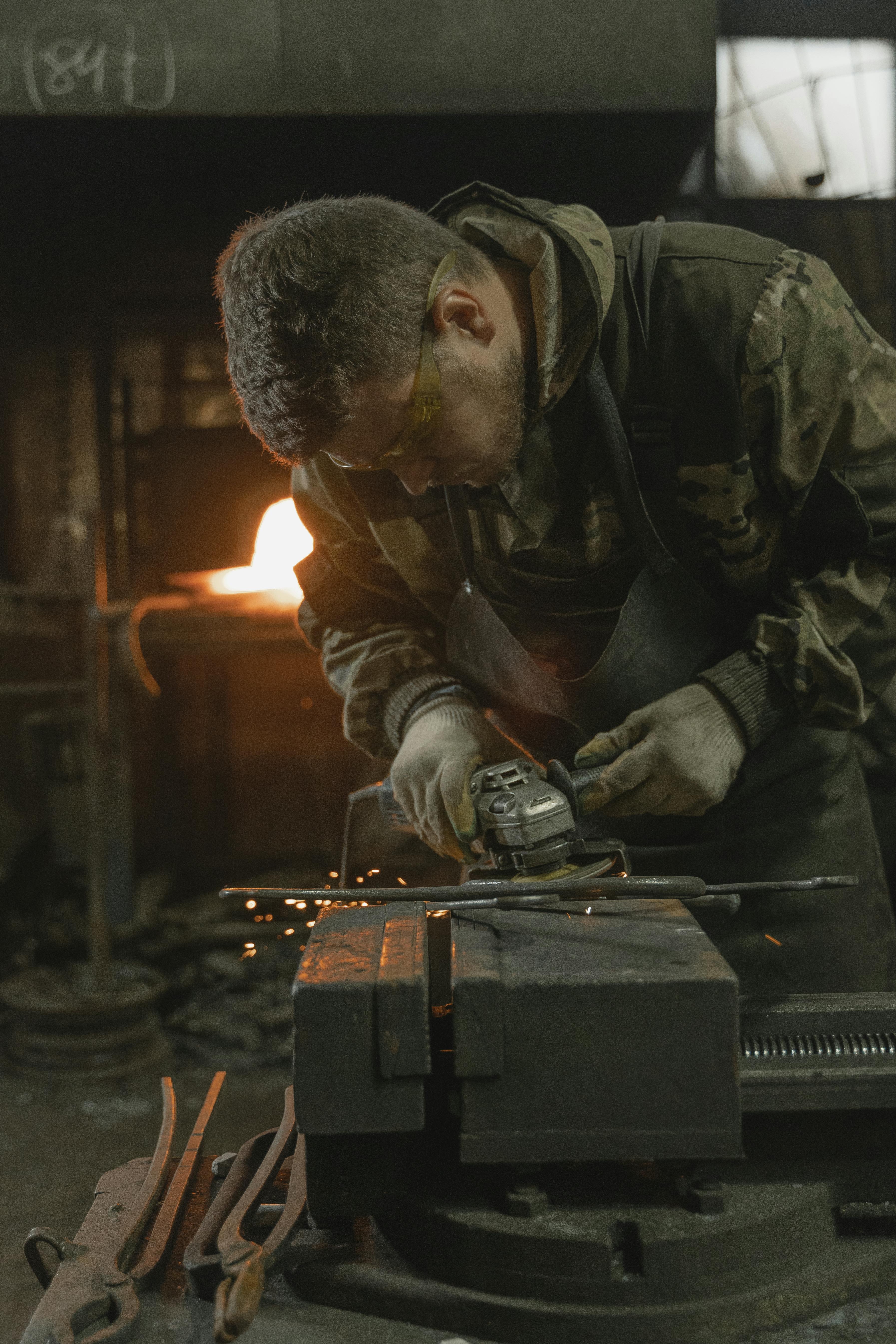a man doing a metalwork