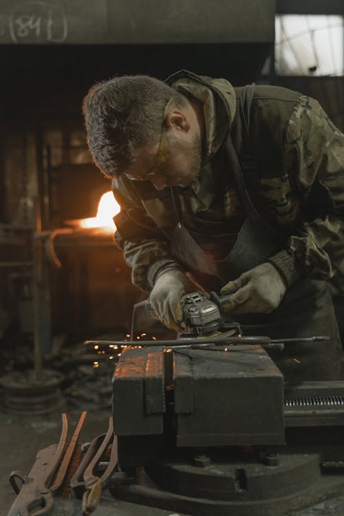 A Man Doing a Metalwork