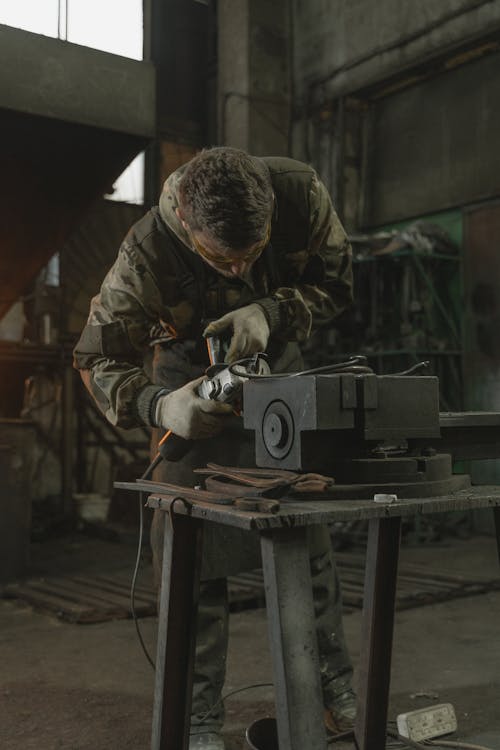 A Man Doing a Metalwork