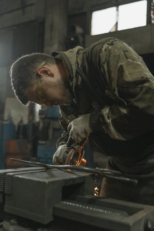 A Man Doing a Metalwork