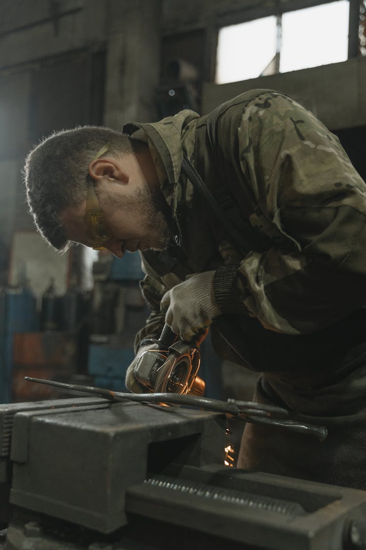 A Man Doing A Metalwork