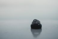 Engagement rings on straight white surface