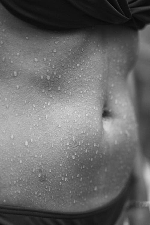 Grayscale Photo Of Water Droplets