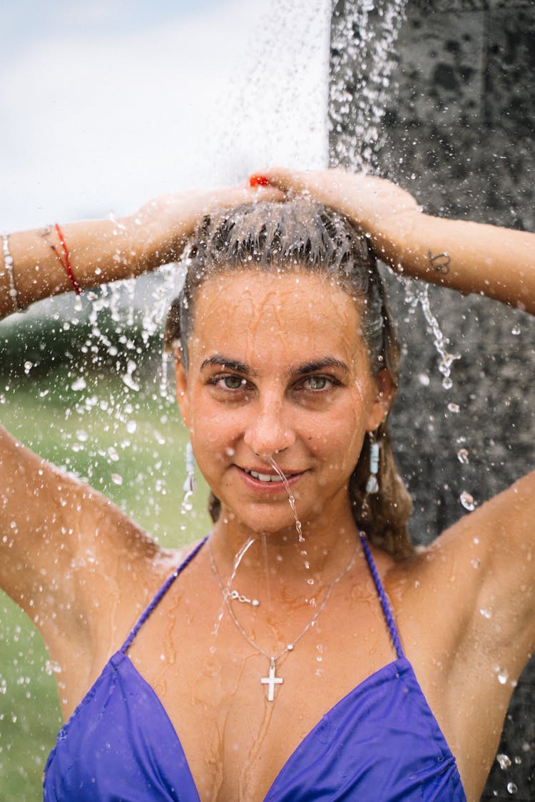 Close-Up Shot Of A Woman Showering 