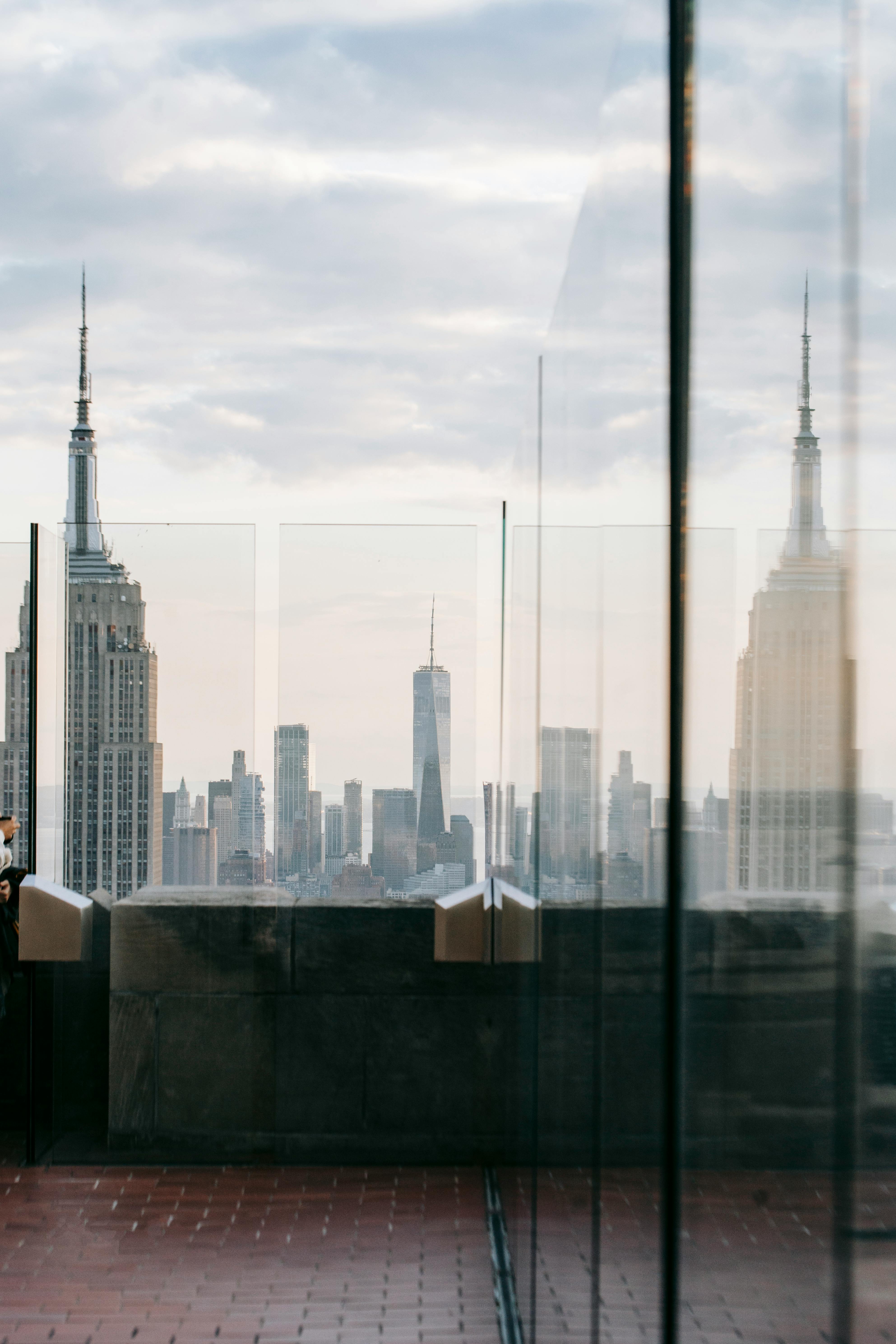 building rooftop with fence reflecting skyscraper in usa