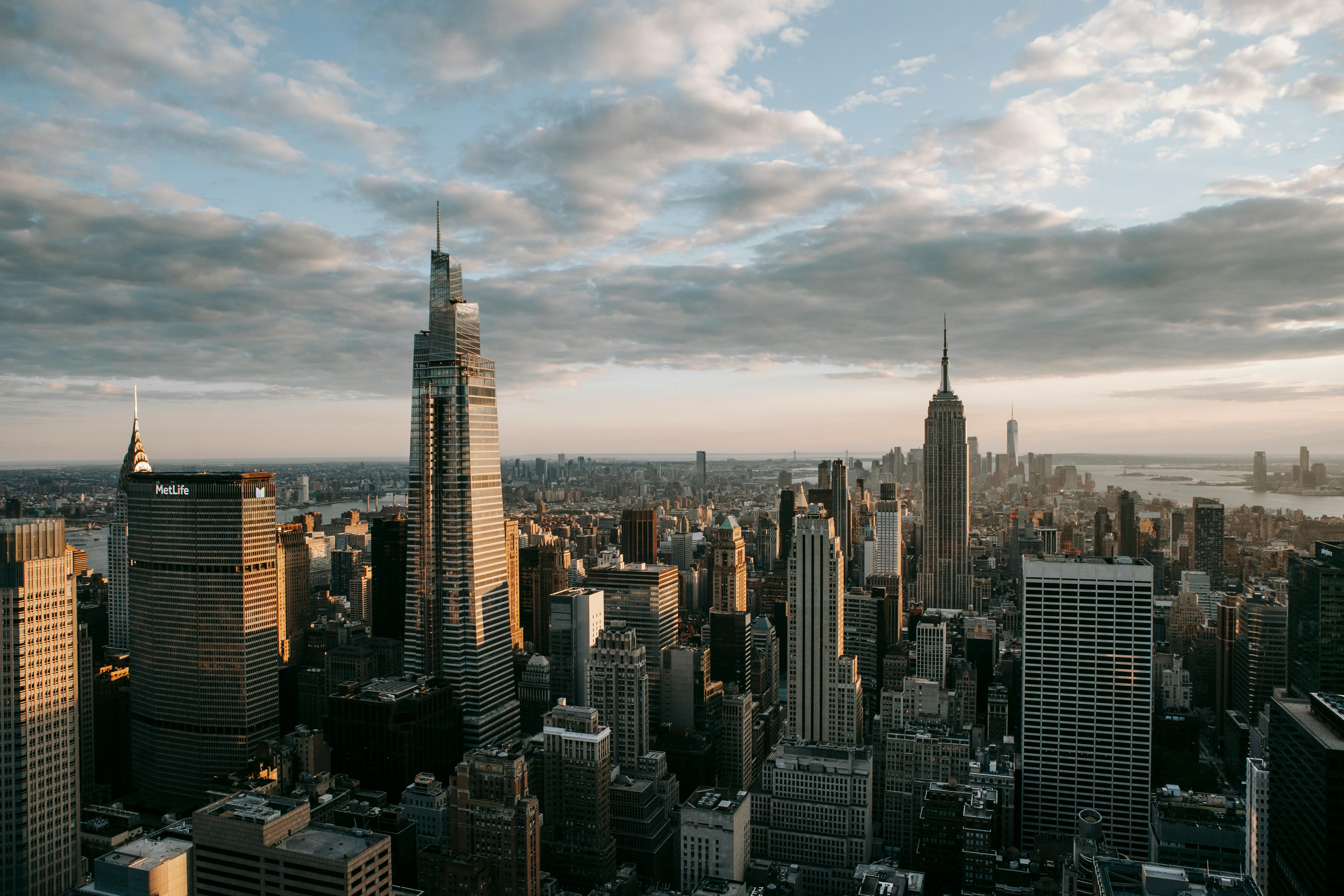 contemporary skyscrapers against sea in new york city