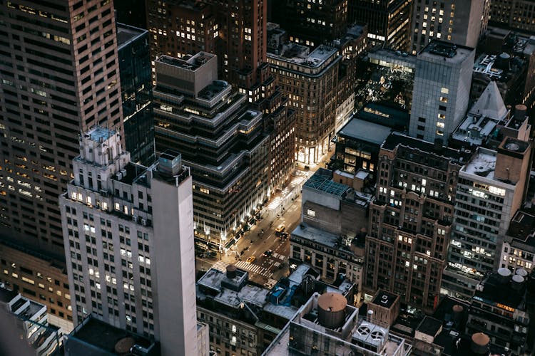 Modern Illuminated City District In Evening