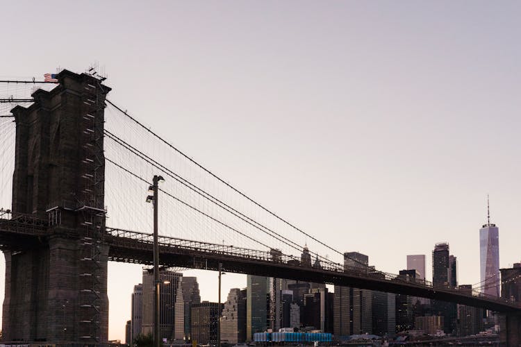 Stone Suspension Bridge In Center Of City