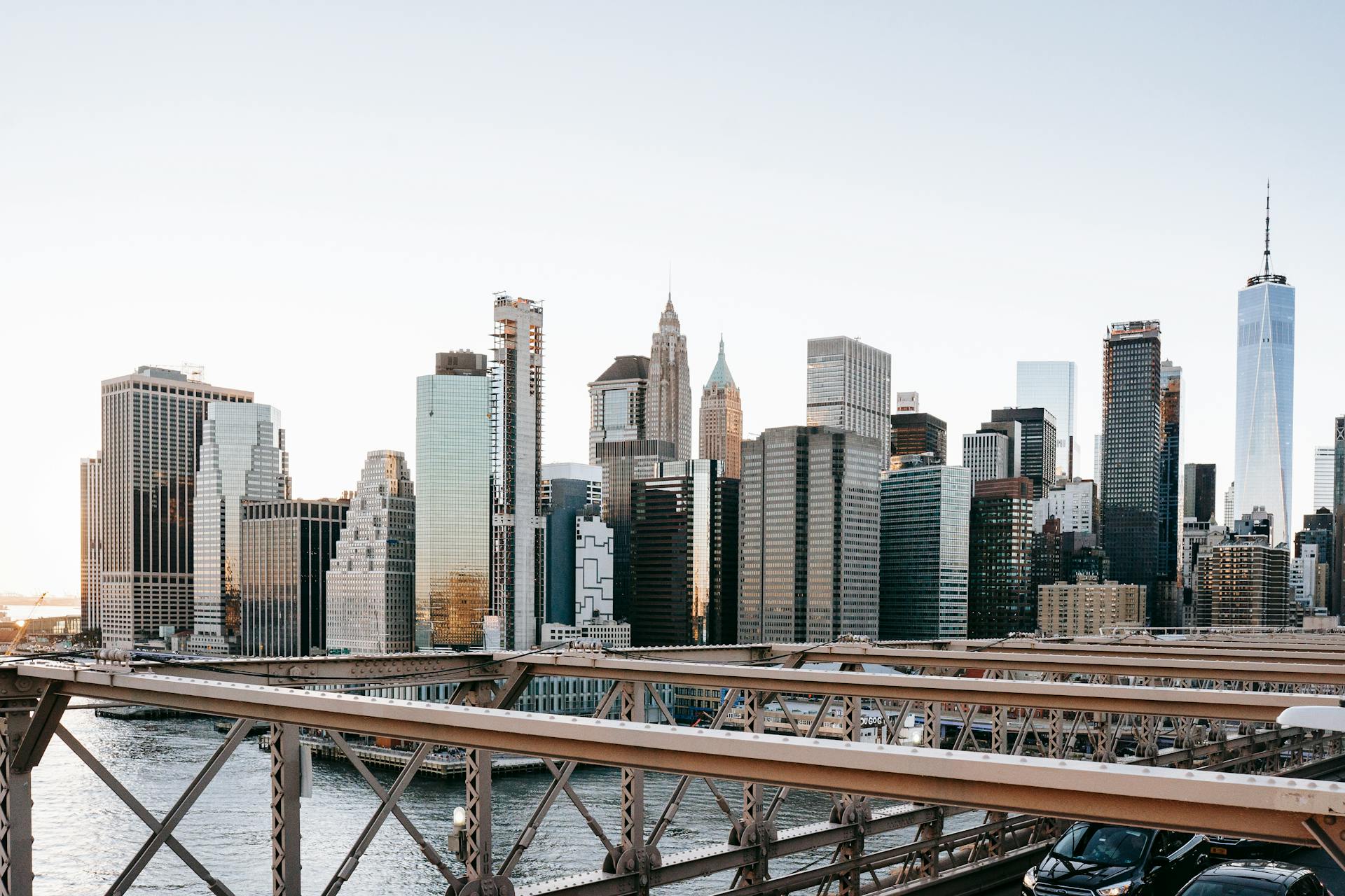 A stunning view of the New York City skyline captured from the iconic Brooklyn Bridge.