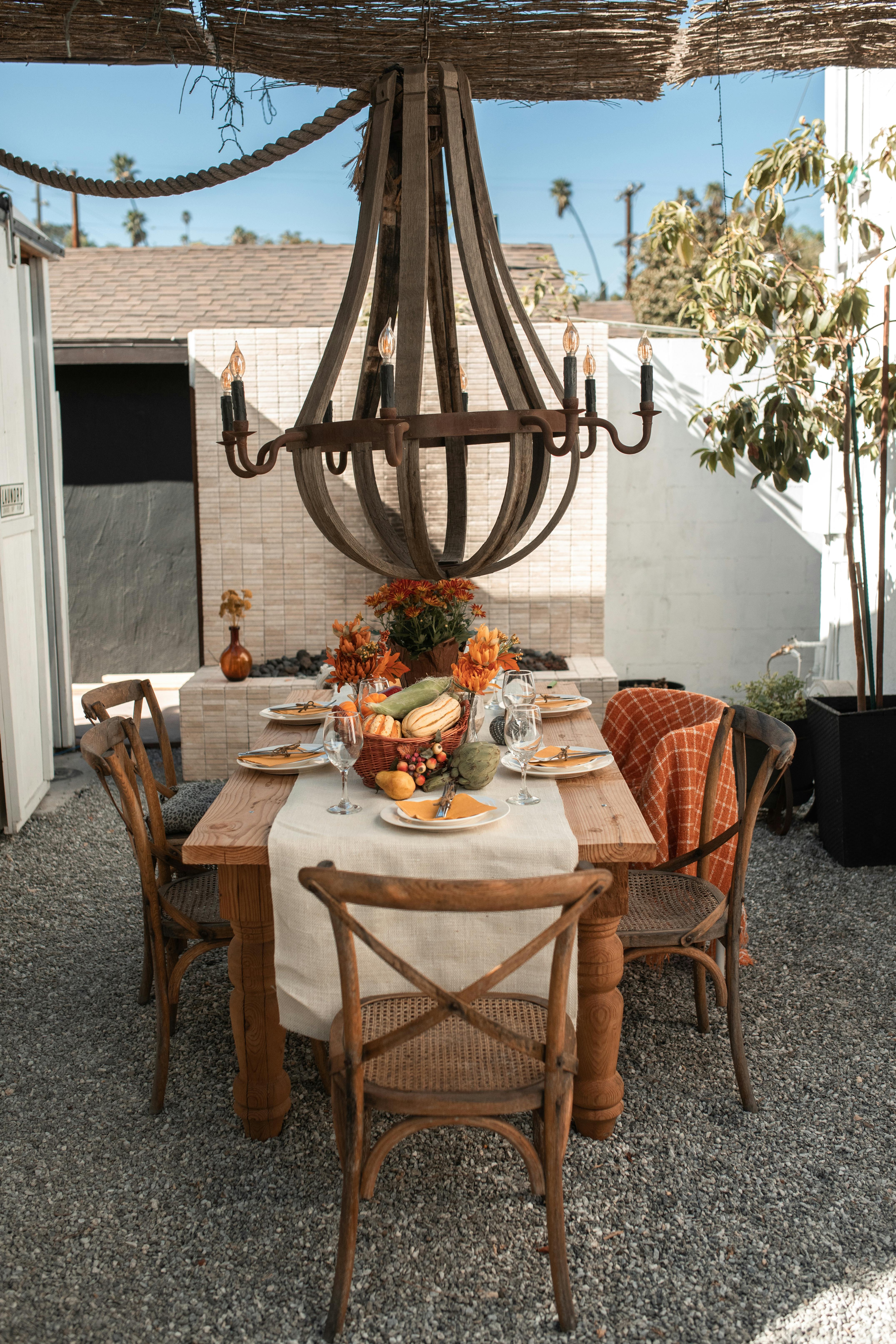 brown wooden table with chairs