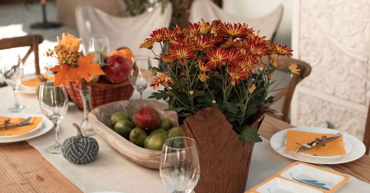 Dining Table with Fruits and Flowers · Free Stock Photo