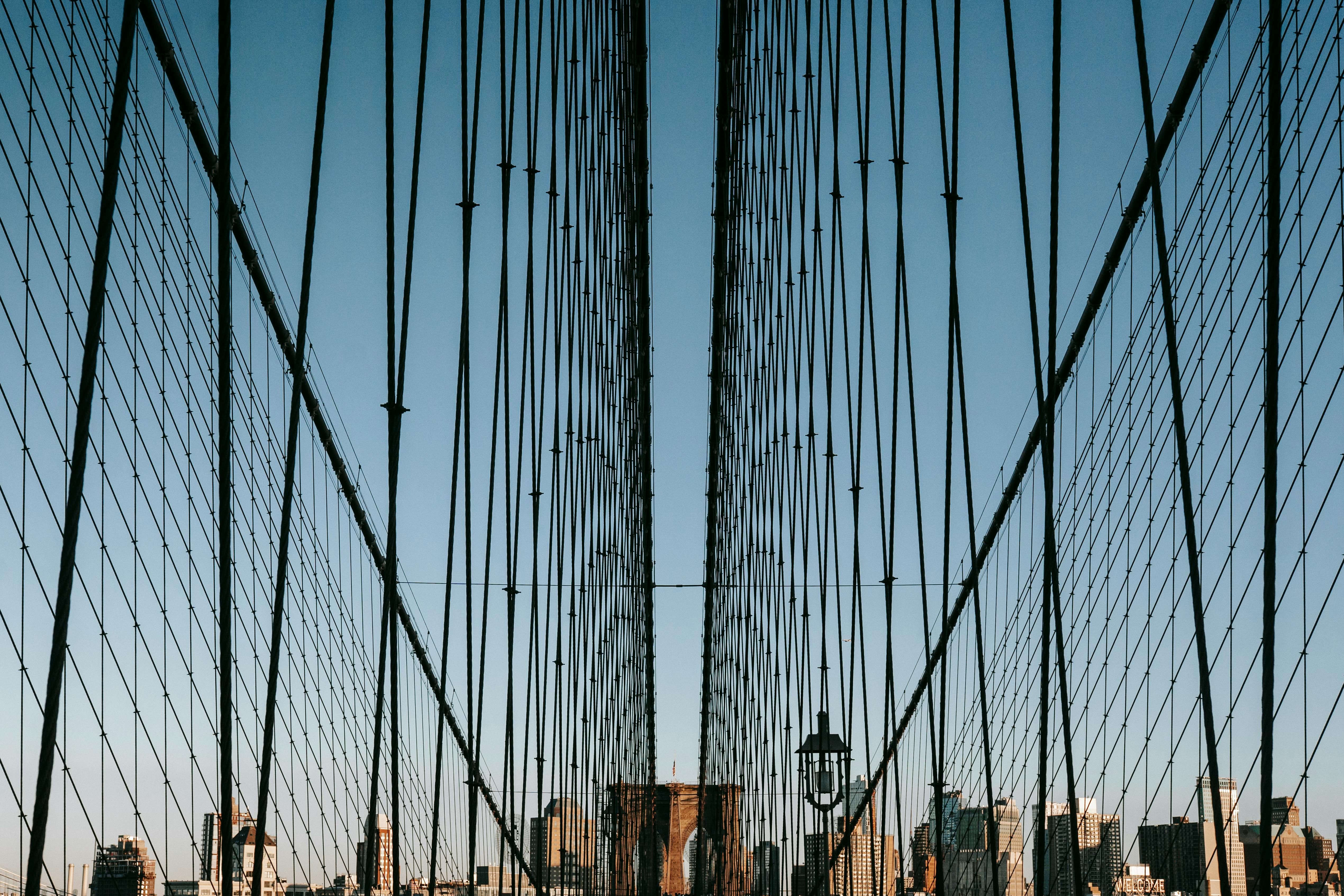 Steel cables on suspension bridge in daytime · Free Stock Photo