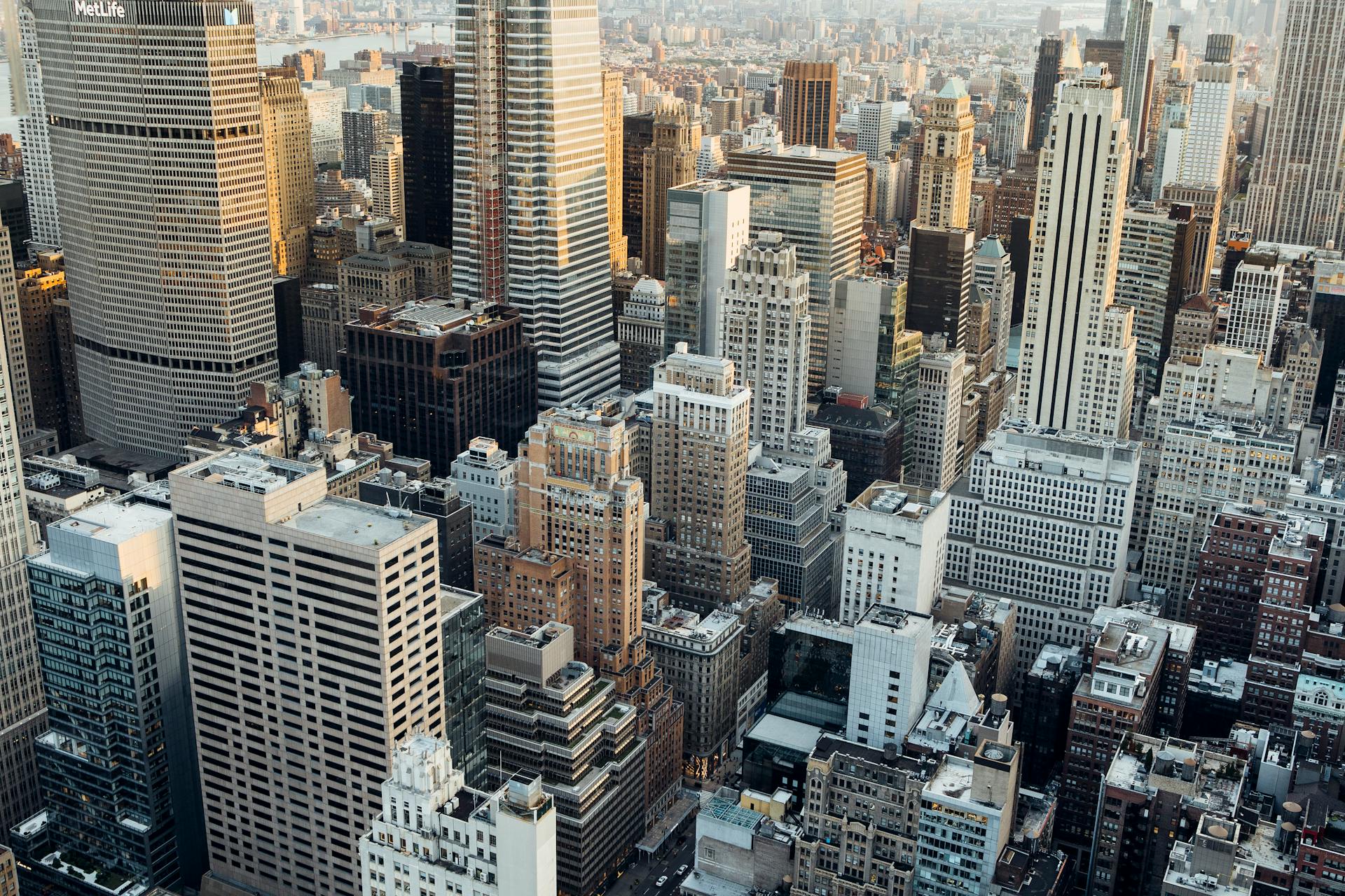 An aerial view of New York City showcasing iconic skyscrapers and urban architecture.