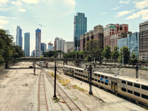View of City Buildings Near Train Tracks