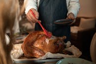 Hand Brushing Roasted Chicken