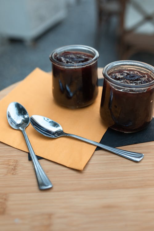 Stainless Teaspoons on Brown Paper