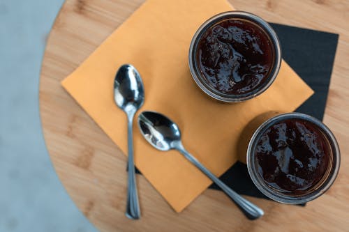Free Round Containers with Black Cold Pudding Stock Photo