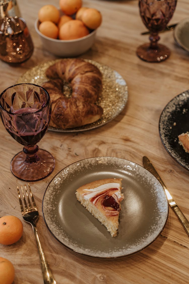 Slice Of Cake On Brown Round Plate