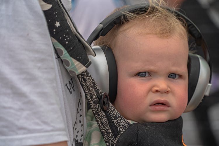 Angry Baby With Headphones