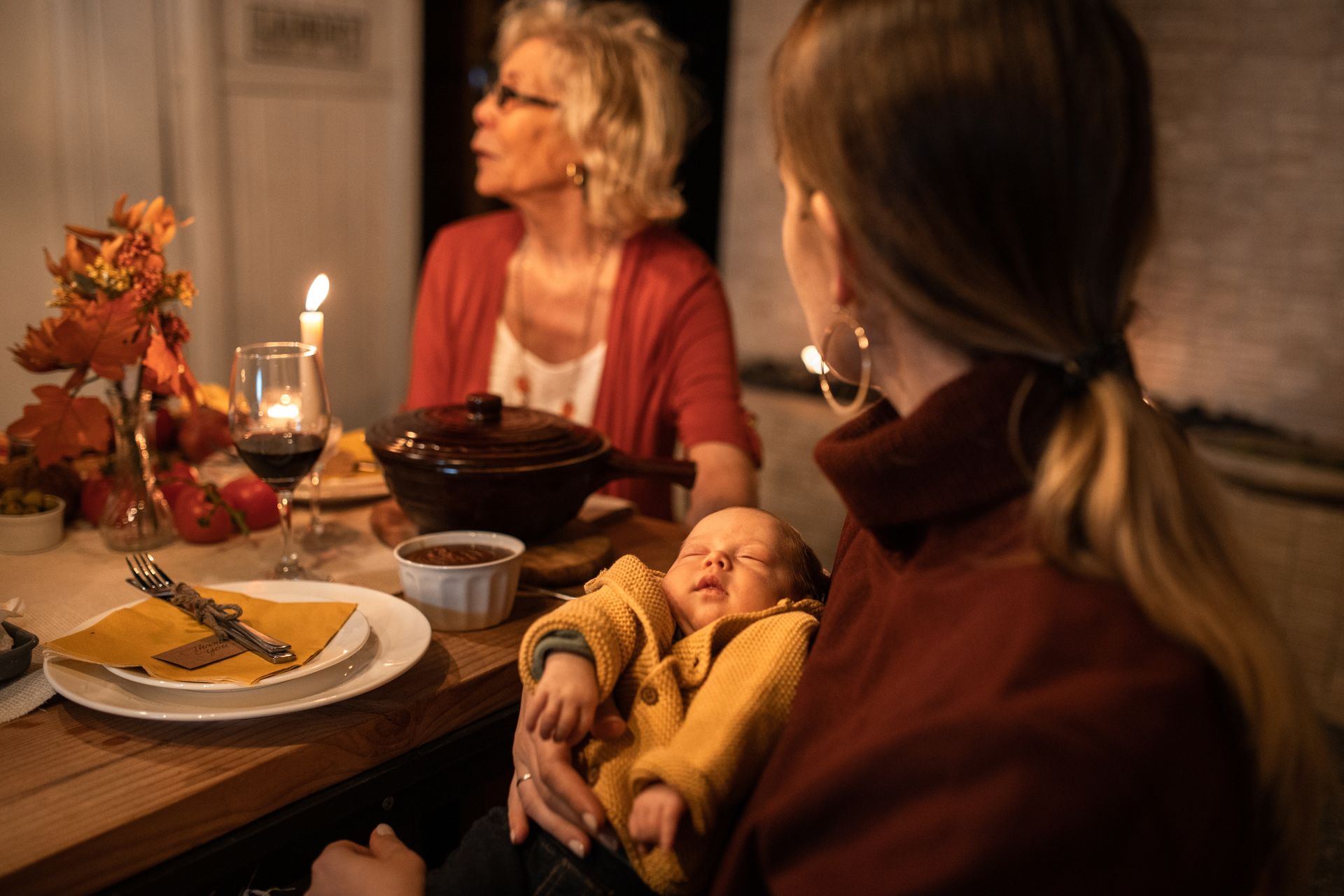 A warm family gathering during Thanksgiving with food and togetherness.