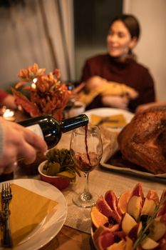 Man in Brown Dress Shirt Holding Wine Glass