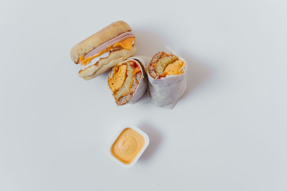 Prepared breakfast burrito and breakfast sandwich