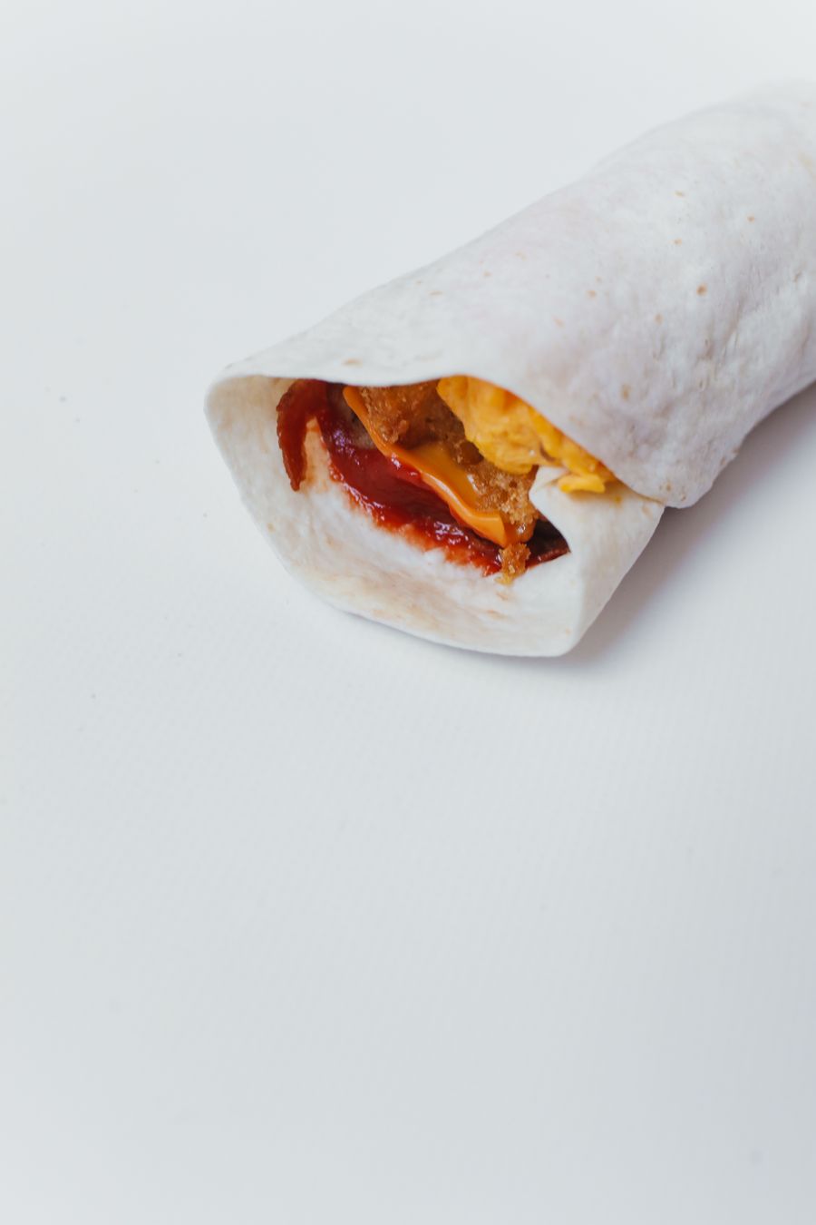 Breakfast burrito with eggs and savory filling