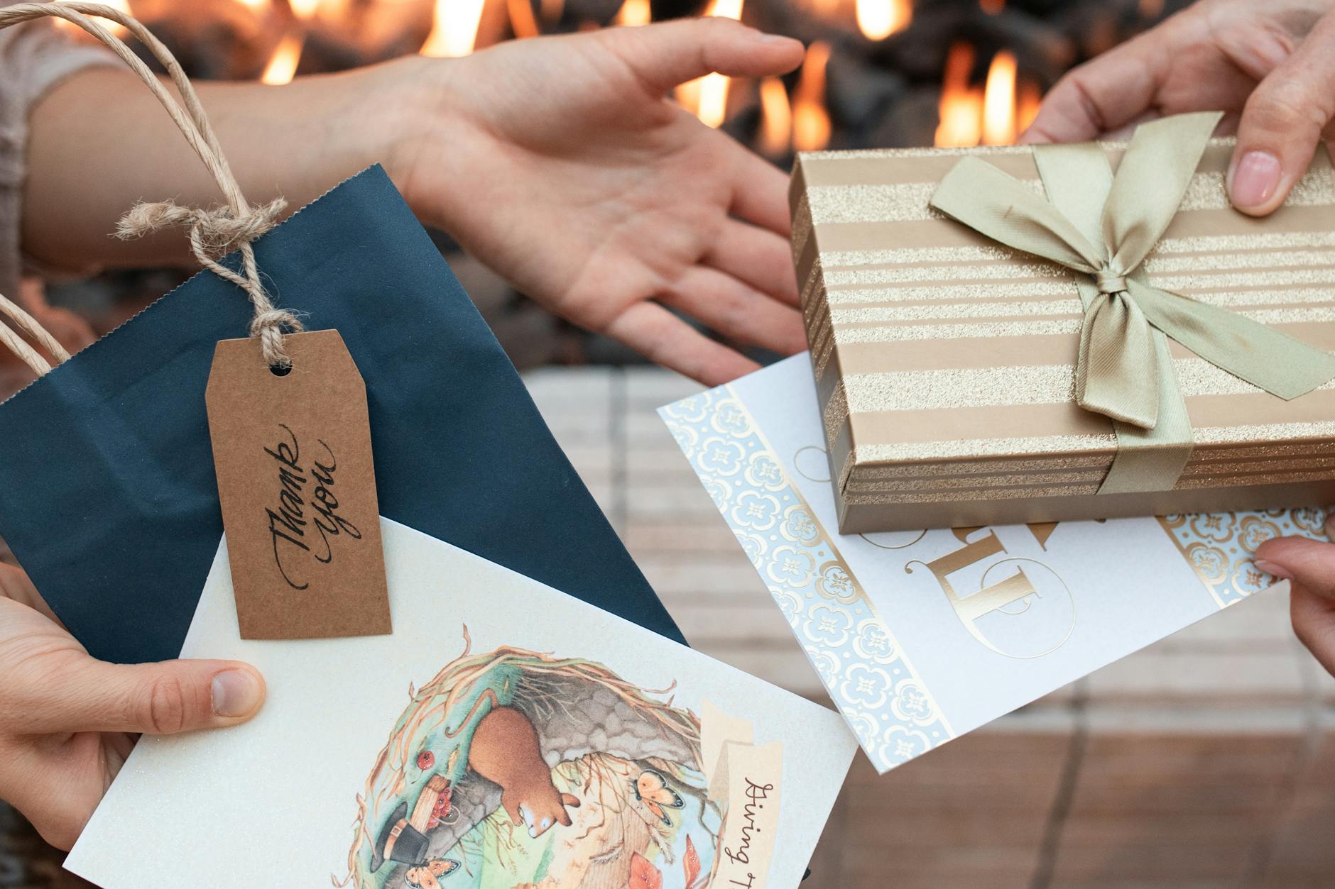 https://www.pexels.com/photo/people-exchanging-gifts-5848073/